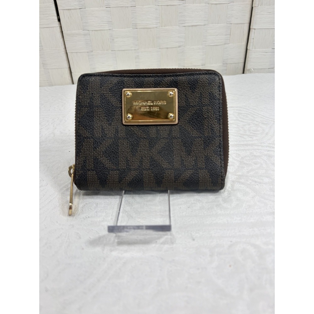 Michael Kors Brown monogram zip around small wallet gold tone placard